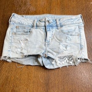 American Eagle Shortie Distressed Jean Shorts w/ Lace Detail size 2
